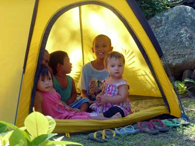 children are having fun in a tent